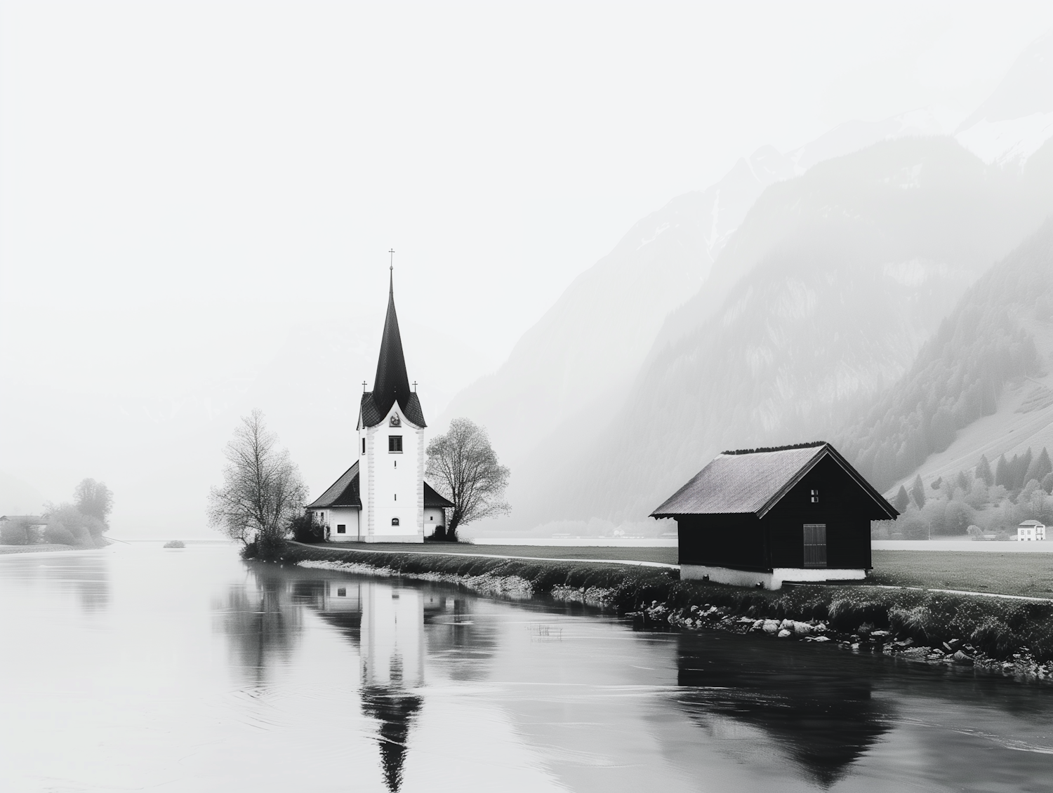 A small white church beside still water, its shape reflected in the surface, with misty mountains behind in almost monochrome light